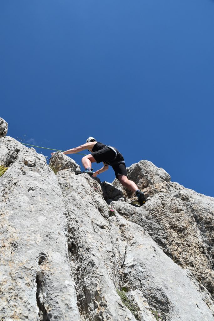 Barbara topping out on the final pitch - Tower of Sabbioni