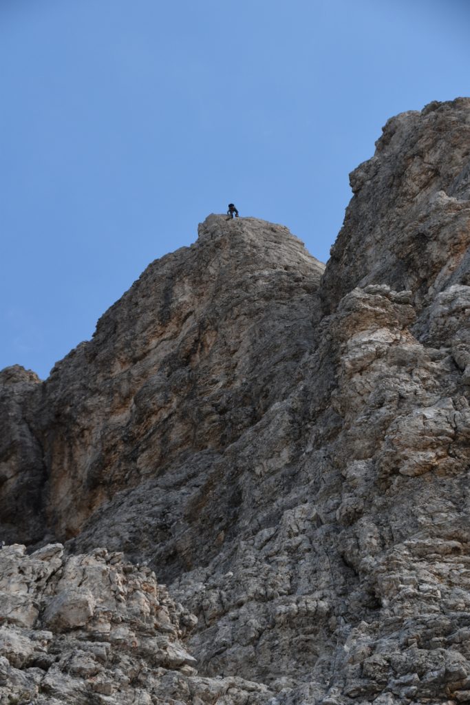 Unknown climber on the top vertical section