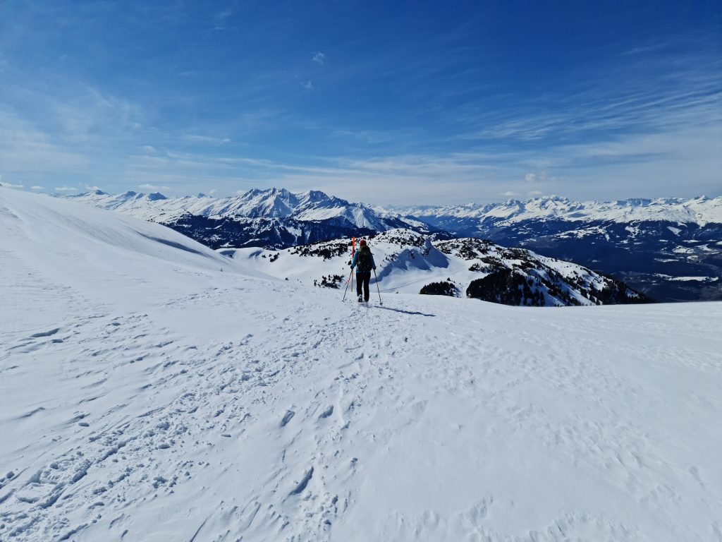 Barbara striding off - trying to get off the plateau and out of the wind