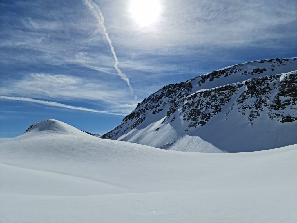 Surrounded by mounds of snow on our snowshoe trail to the Wildsee