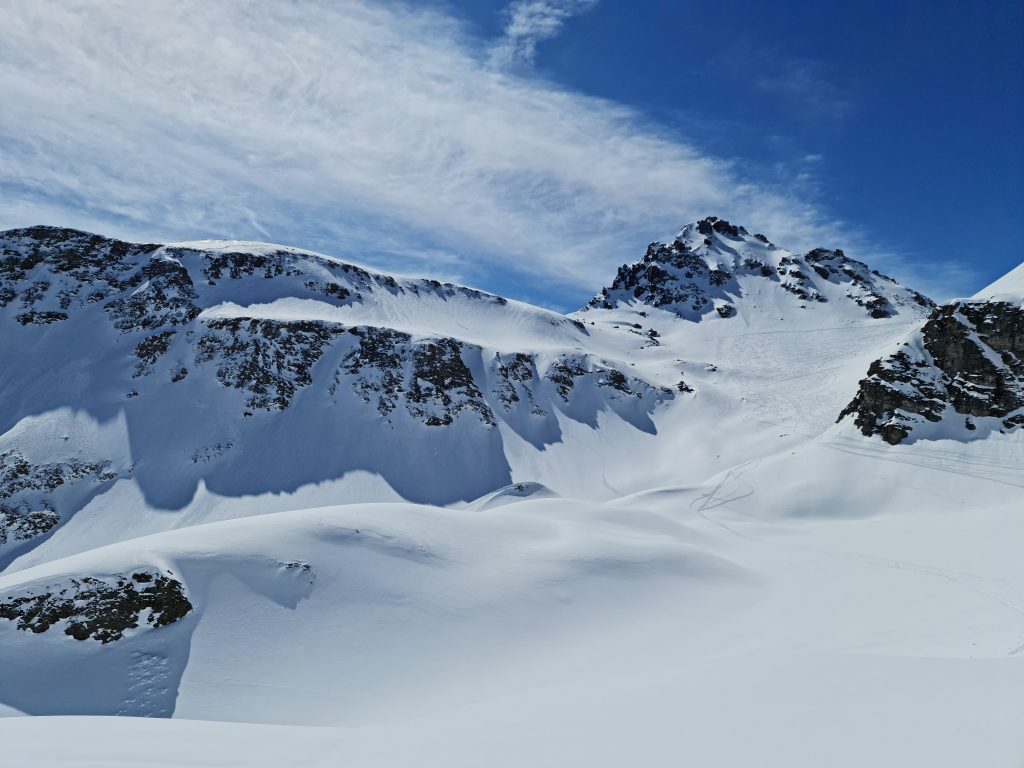 Snow-covered peaks guarding the valley