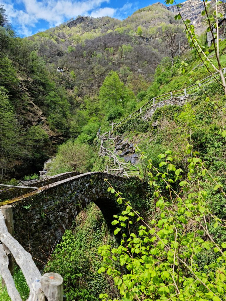 Bridge across deep gorge below Corippo